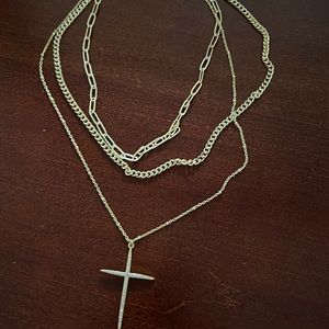 Cute cross Necklace. Three chains connected. Purchased from boutique.